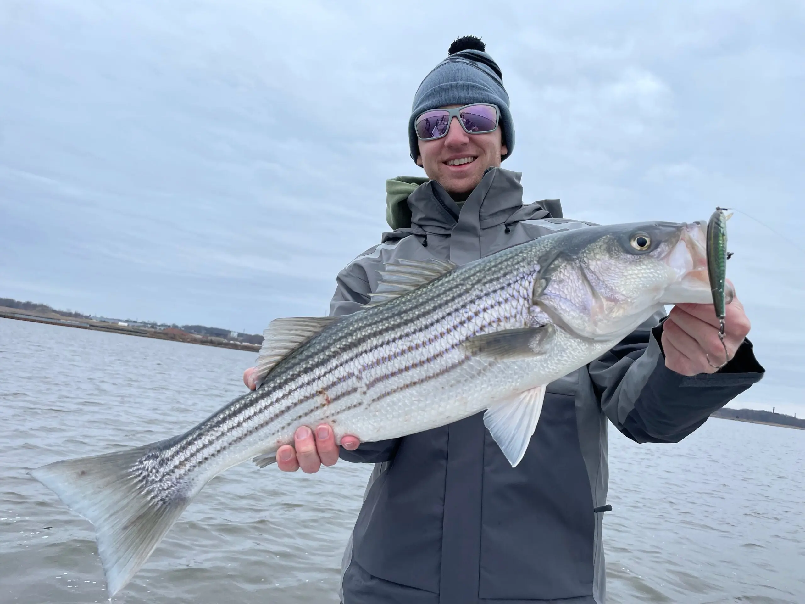 Field &amp; Stream Senior Editor Ryan Chelius with 28-inch striped bass.