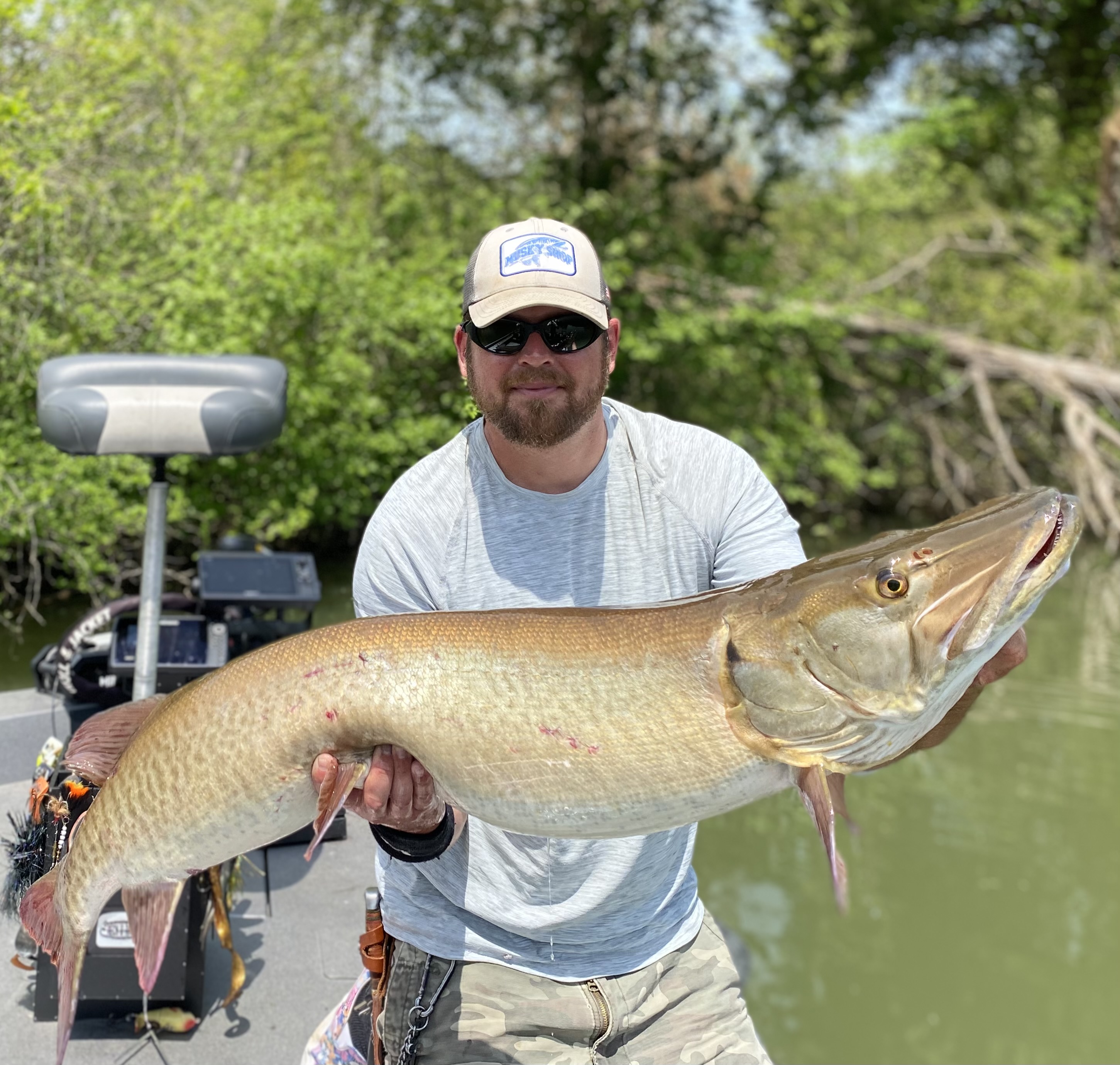 Author Steve Paul holding up a big musky. 