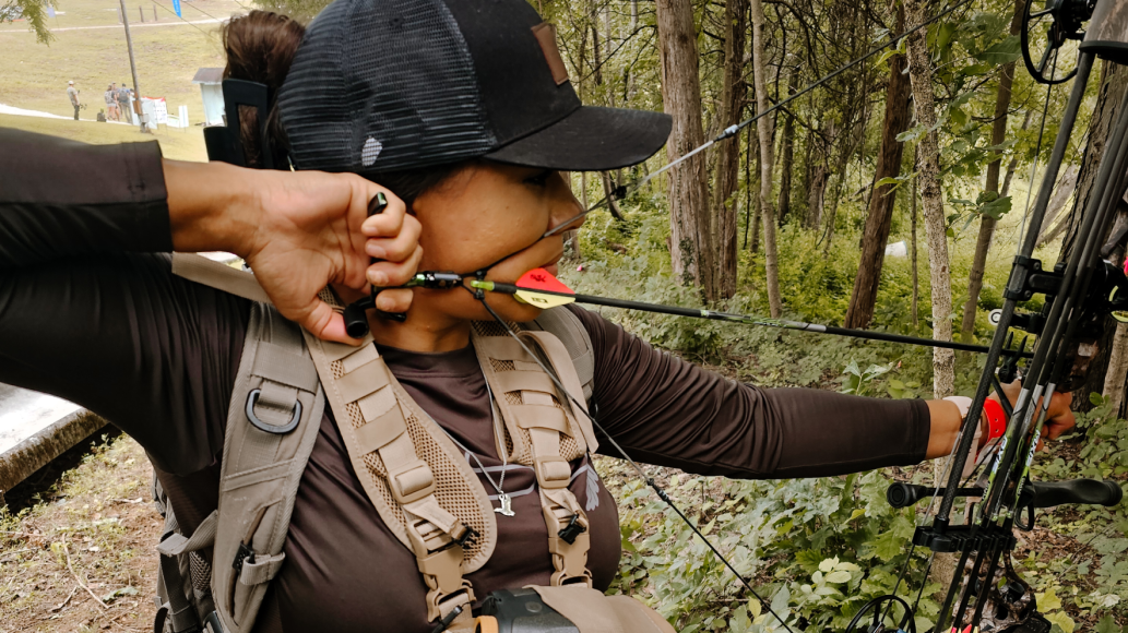 Woman shooting Bowtech Eva Gen3 Compound Bow