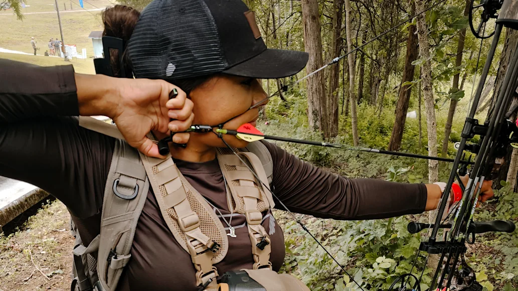 Woman shooting Bowtech Eva Gen3 Compound Bow