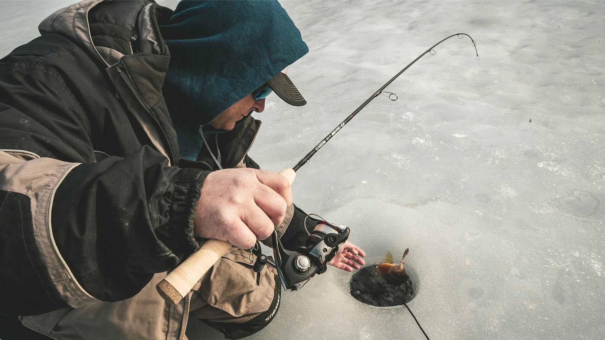 angler ice fishing