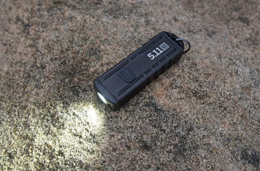 5.11 Tactical Deploy K-USB flashlight on ground during testing