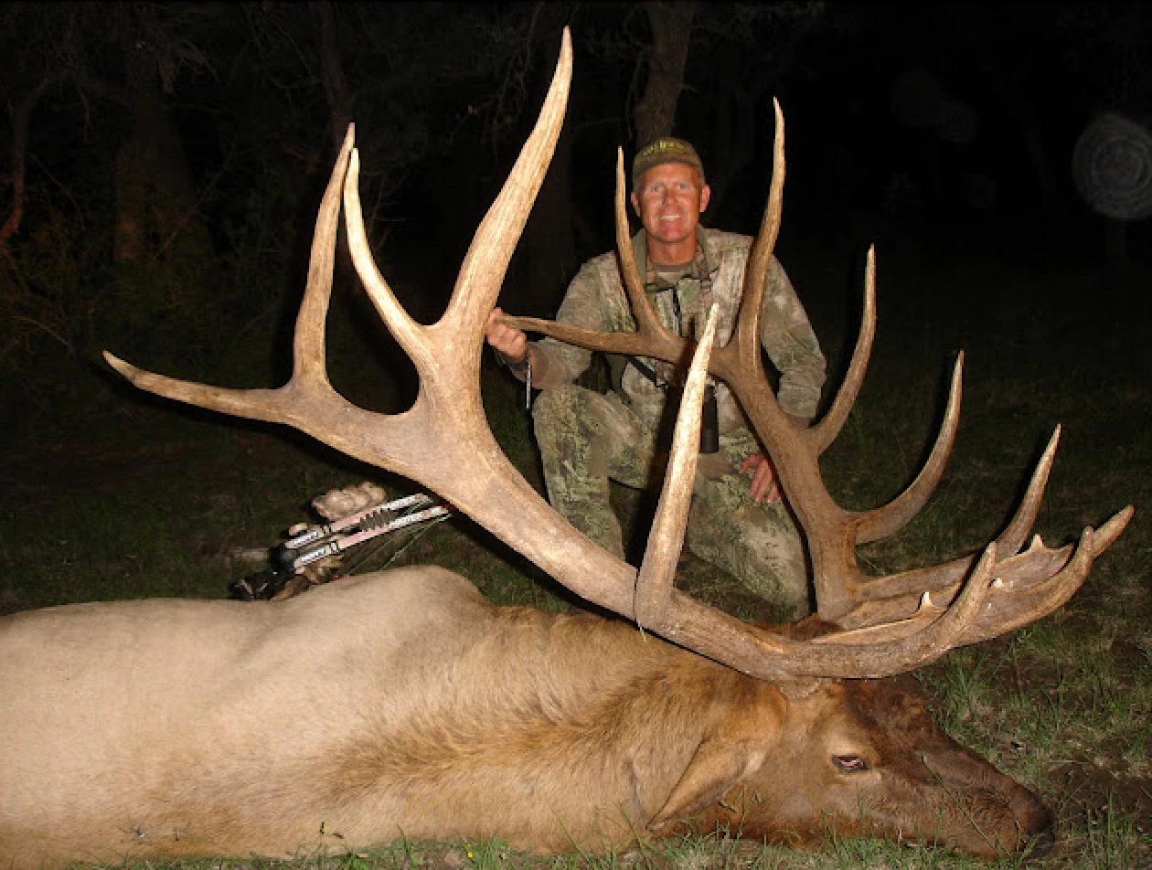 Casey Brook poses with a record-breaking bull elk. 