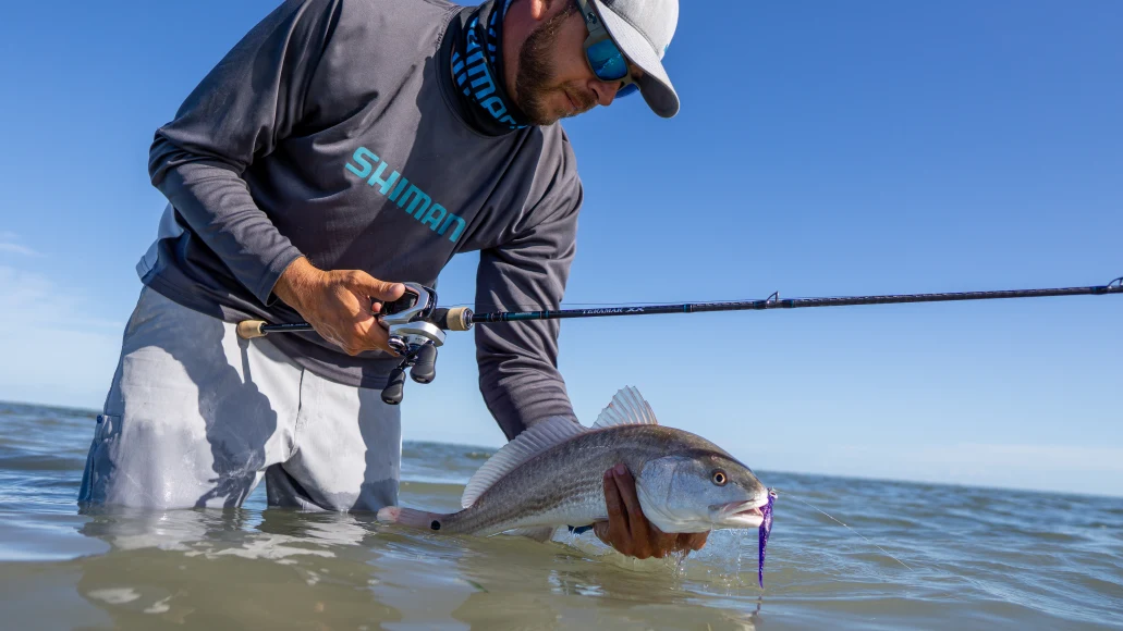 Angler holding up refish