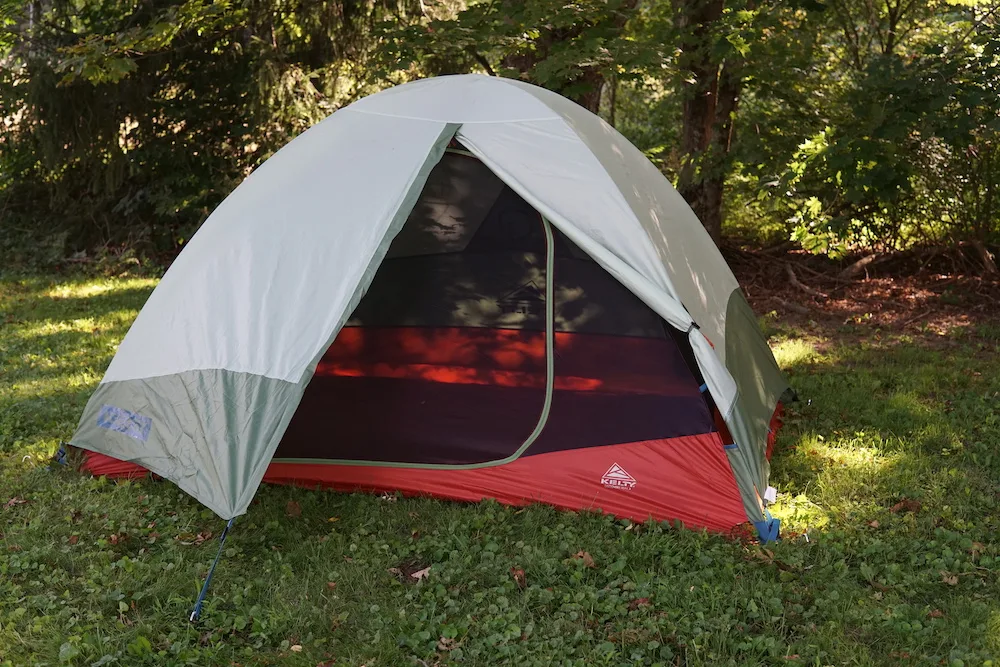 Kelty Discovery Trail Backpacking Tent set up in grass