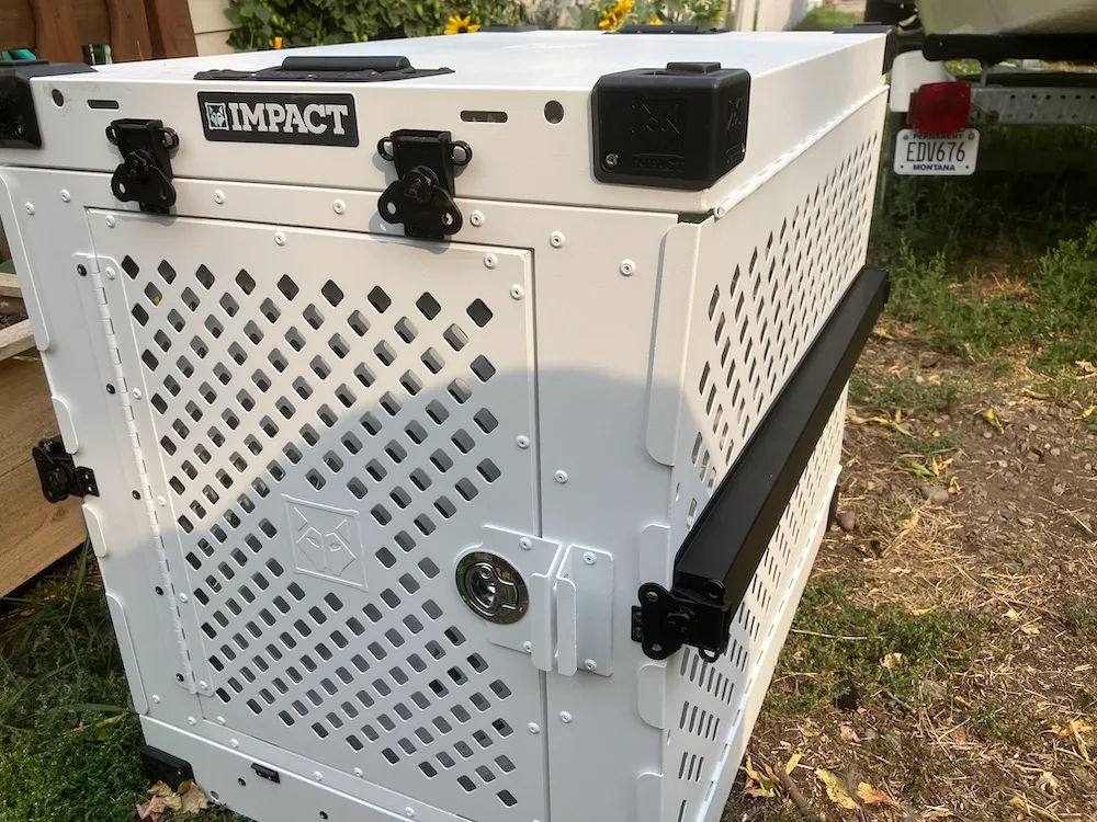 Impact collapsible aluminum dog crate during testing