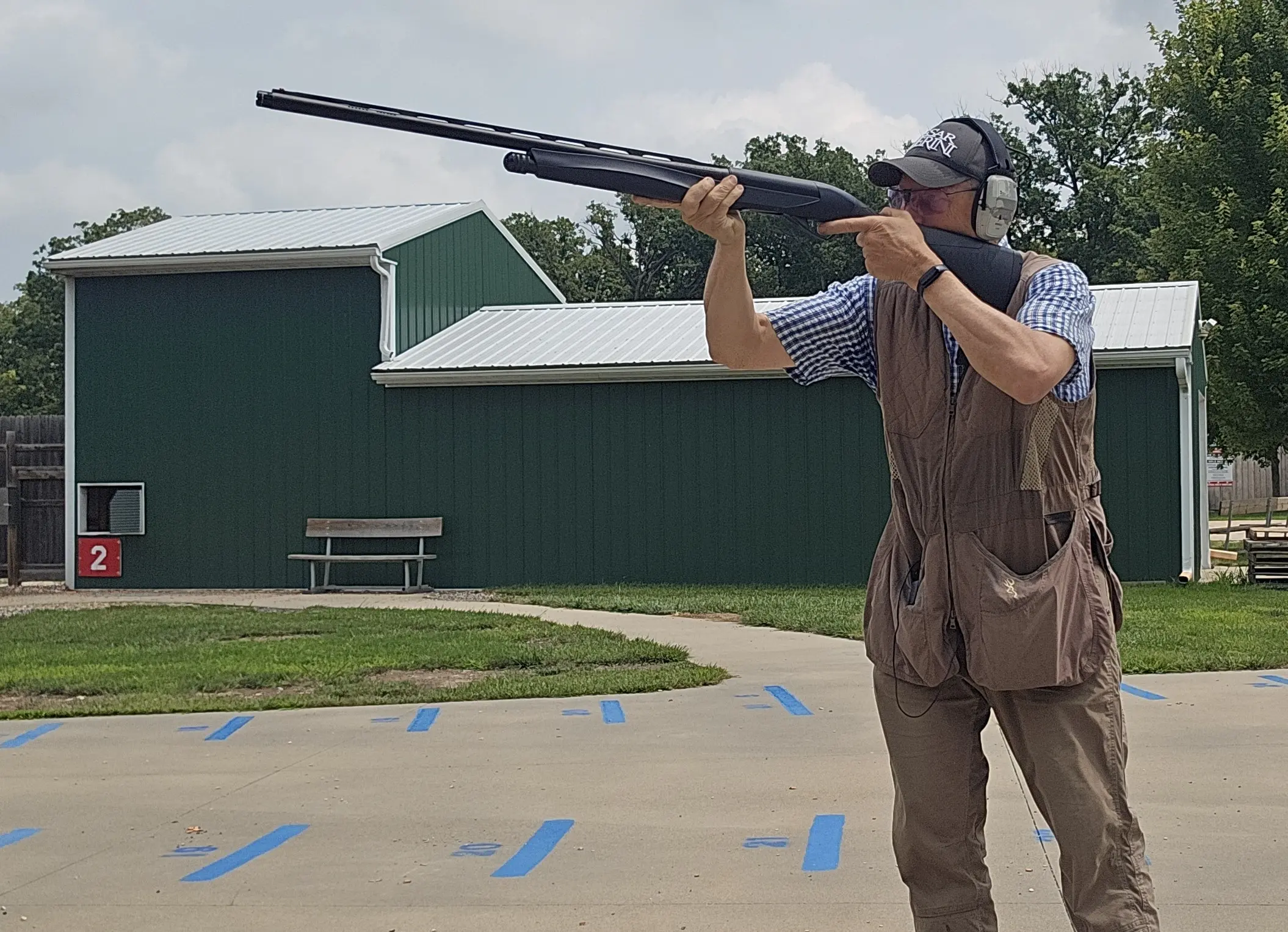 The shooter fires the new Benelli Performance Shop Ethos Cordoba A.I. BE S.T. shotgun on the skeet range.