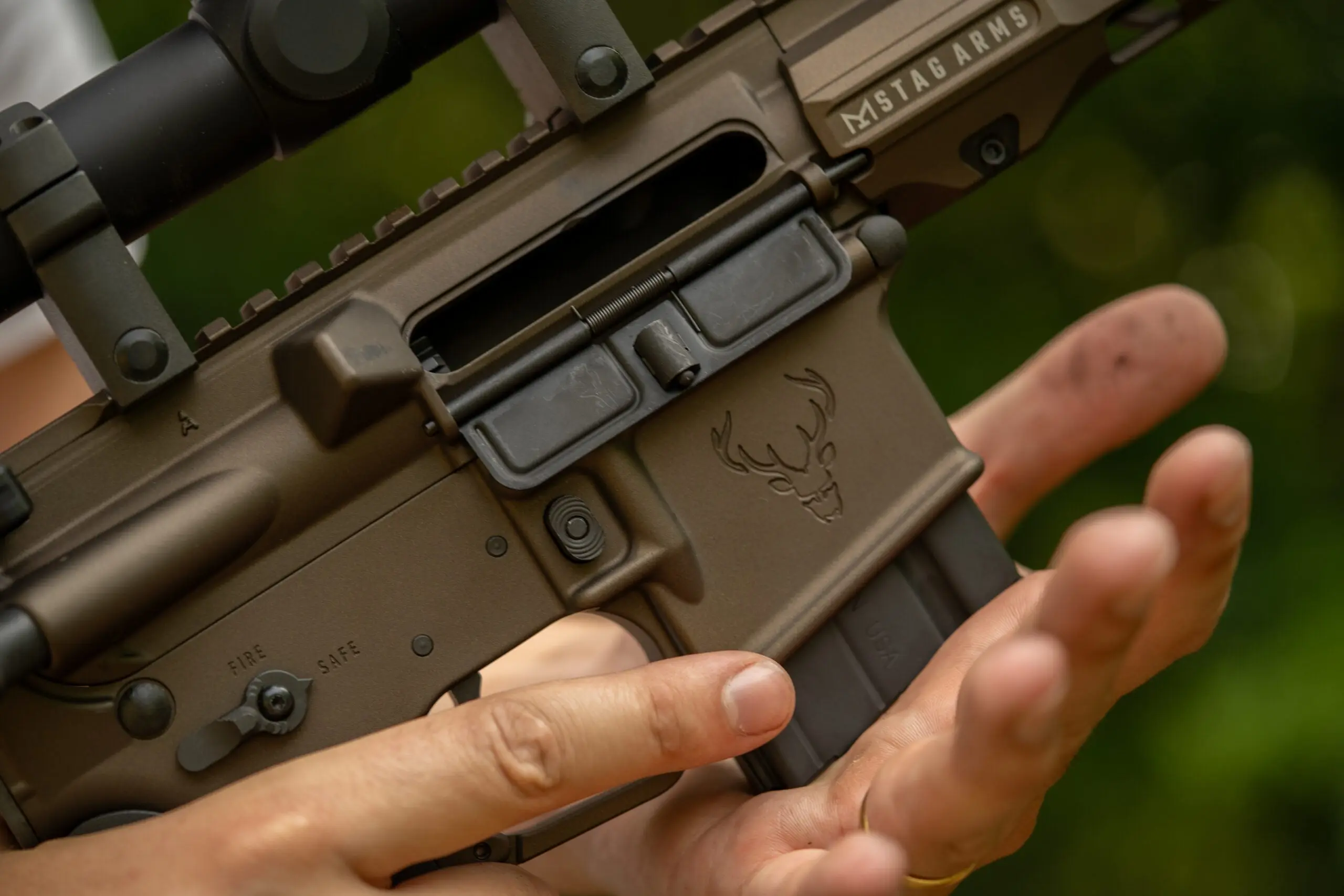 Field &amp; Stream writer loading a magazine into a Stag 15 Pursuit rifle during a product review