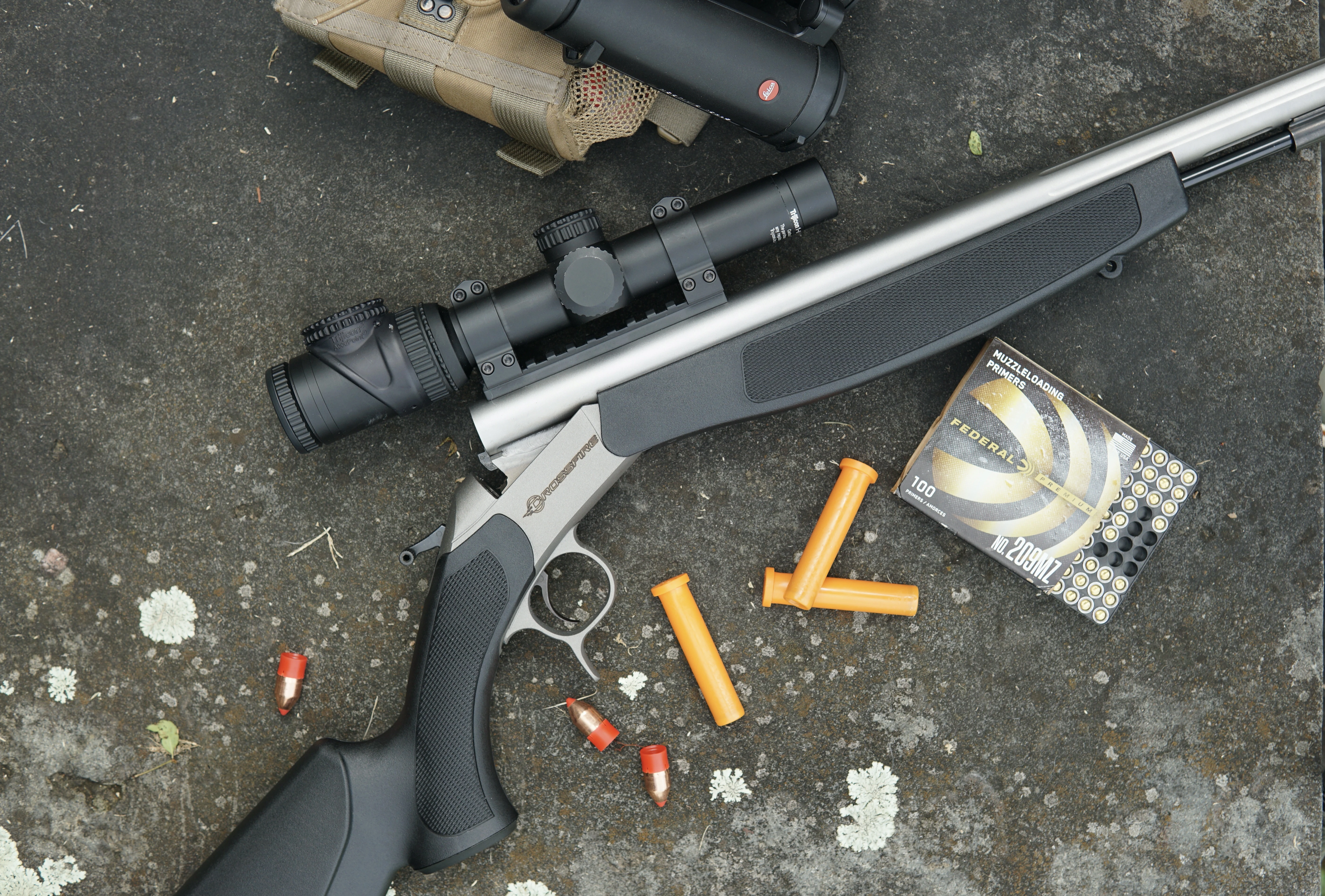 The new CVA Crossfire inline muzzleloader on the ground with Federal Firesticks and primers. 