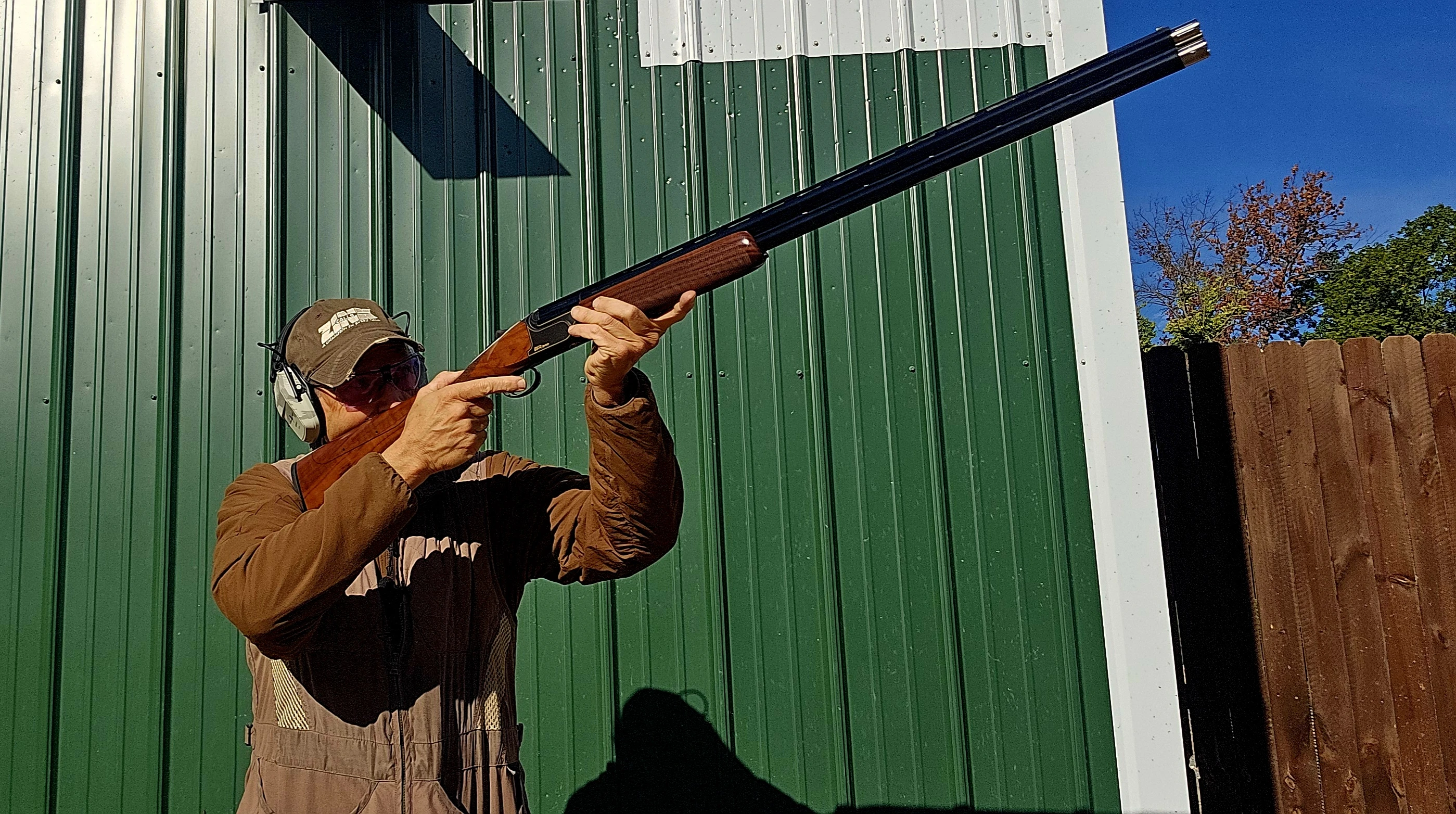 A shooter fires the new Rizzini BR240 Cole Special Sporting at a skeet range. 