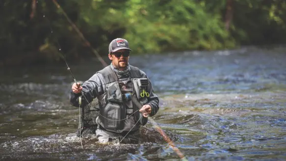 man fly fishing