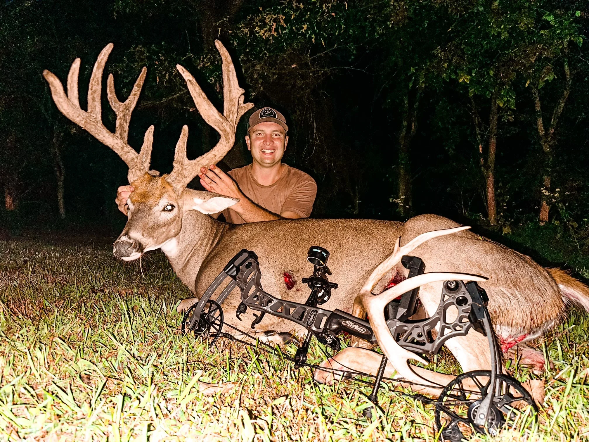 hunter poses with a big Kentucky velvet buck