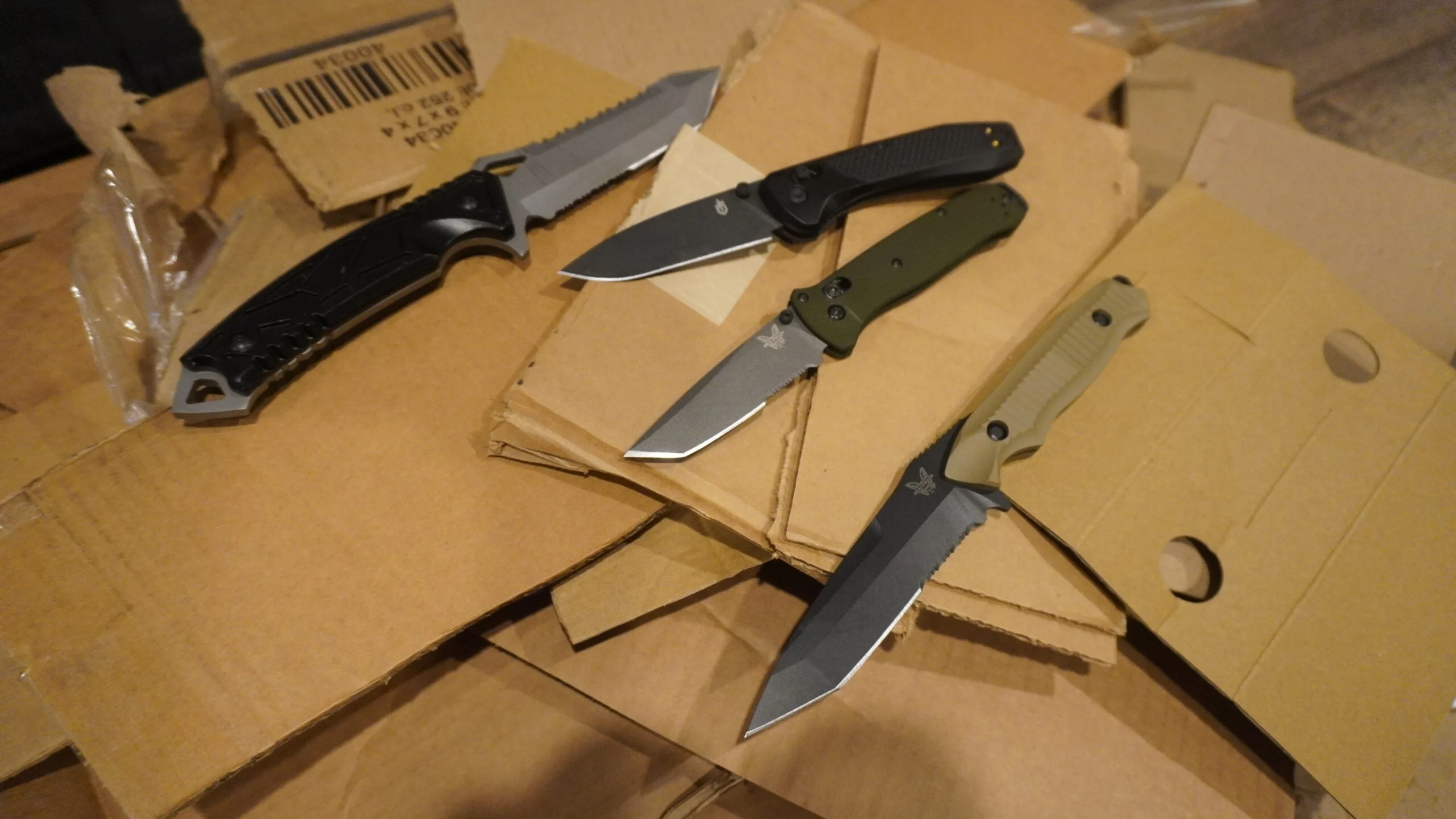 tactical knives during testing cutting cardboard