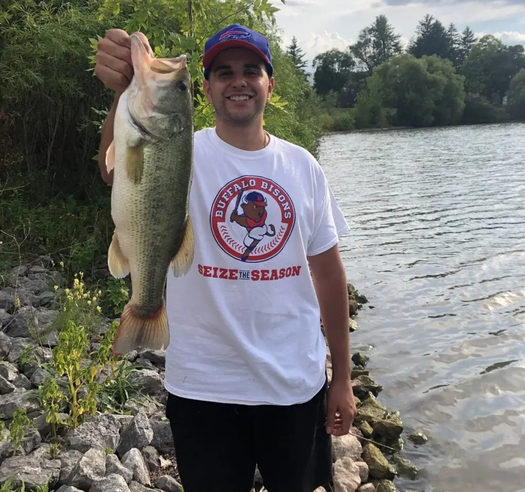 Zaccagnino holds a largemouth bass