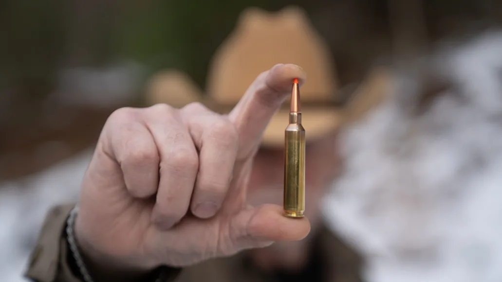 A markman displays Weatherby’s new 25 RPM cartridge.