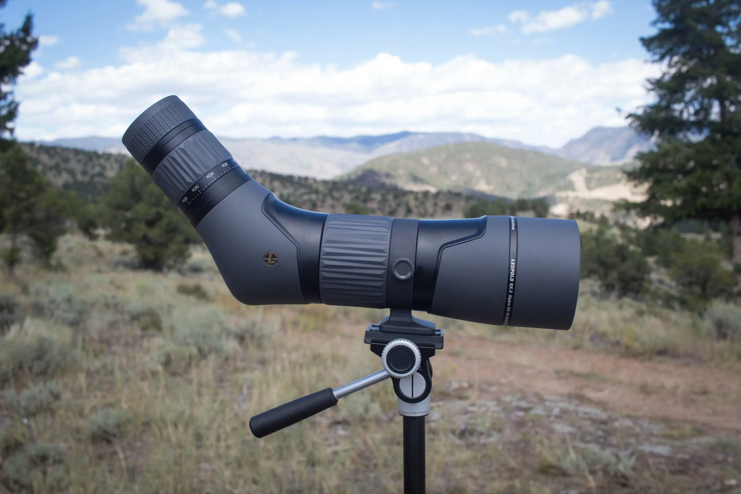 Leupold SX-2 Alpine spotting scope on tripod with mountains in the background