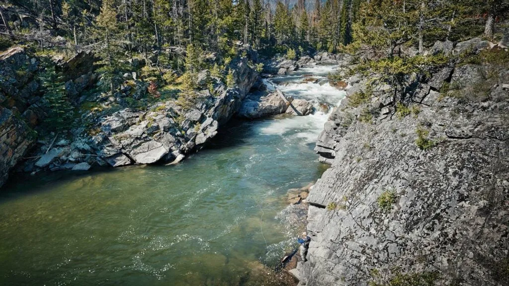 yvon chouinard fishing in stream