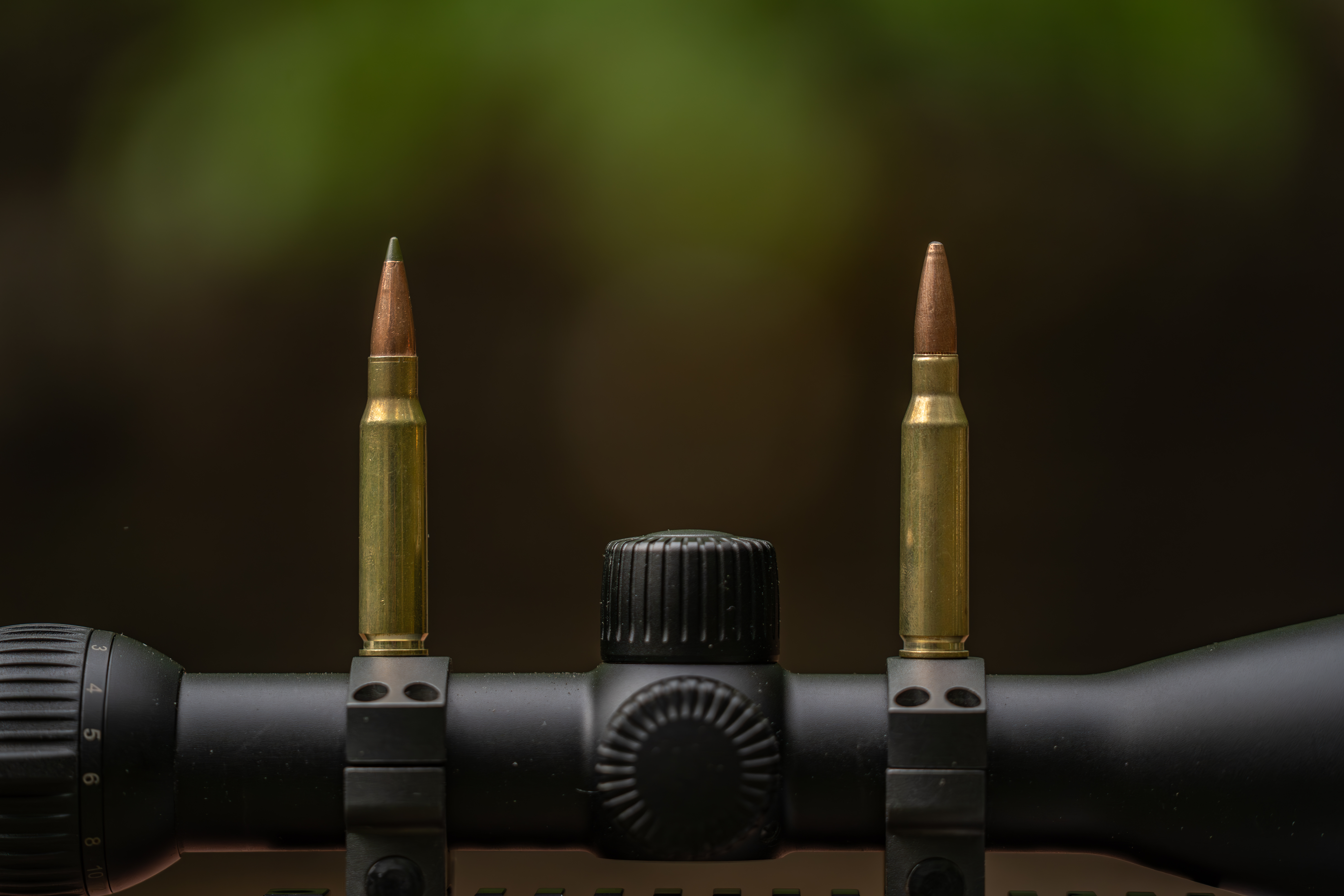 A 7mm 08 cartridge on left and a 308 cartridge on right. 
