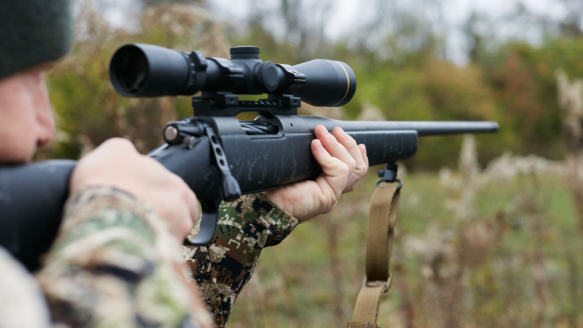 Hunter shooting Christensen Arms rifle