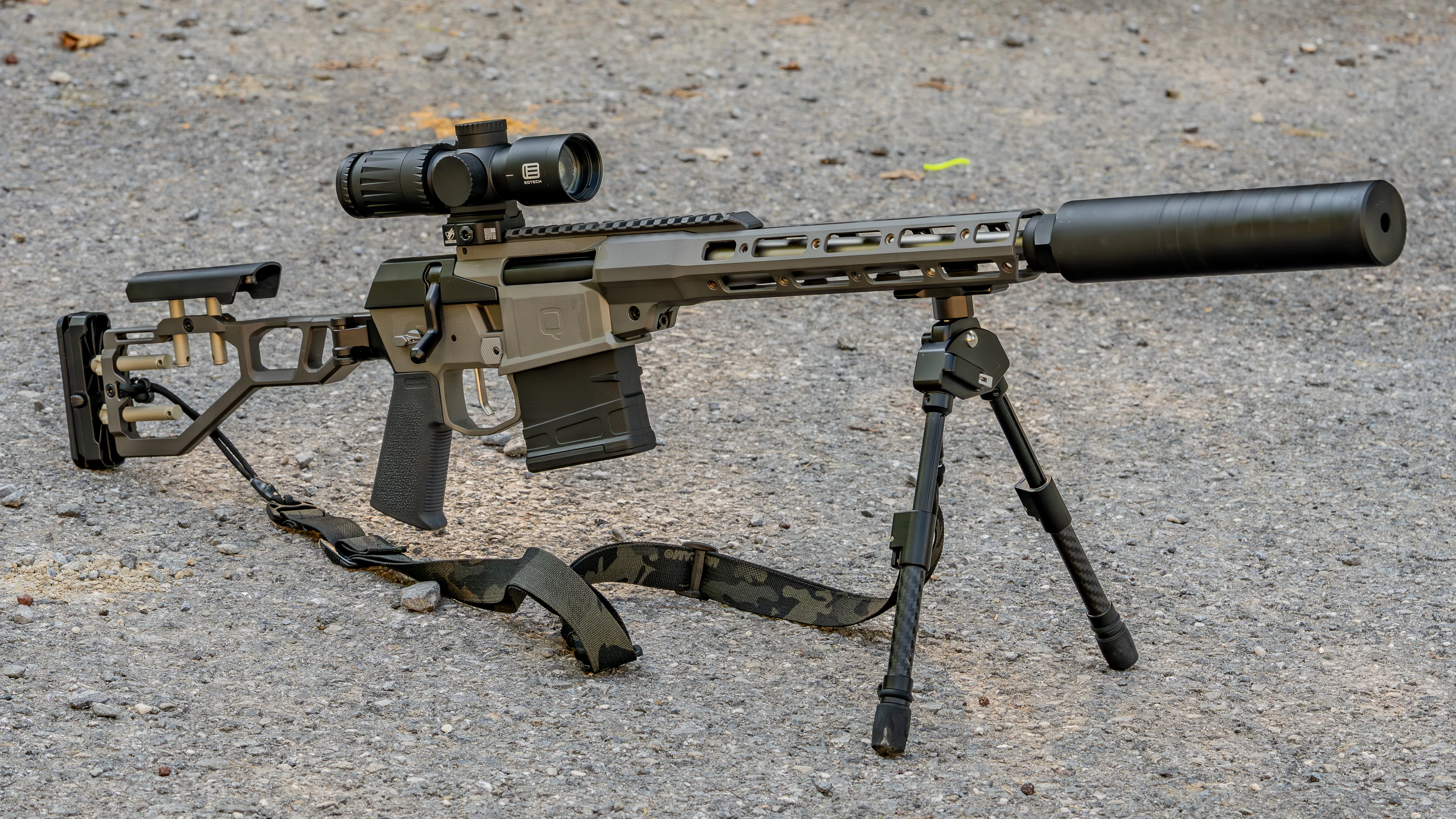 The Q Fix SBR Suppressed with bipod on a shooting range. 