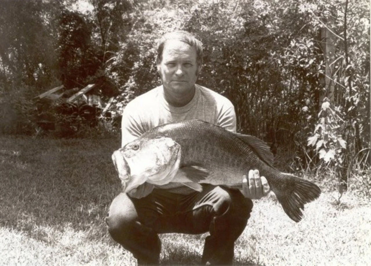 An angler poses with the Florida record for largemouth bass. 