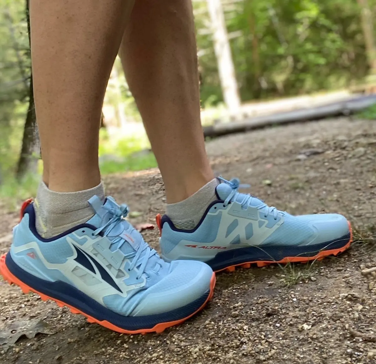 Woman wearing Altra Lone Peak 7 trail running shoes