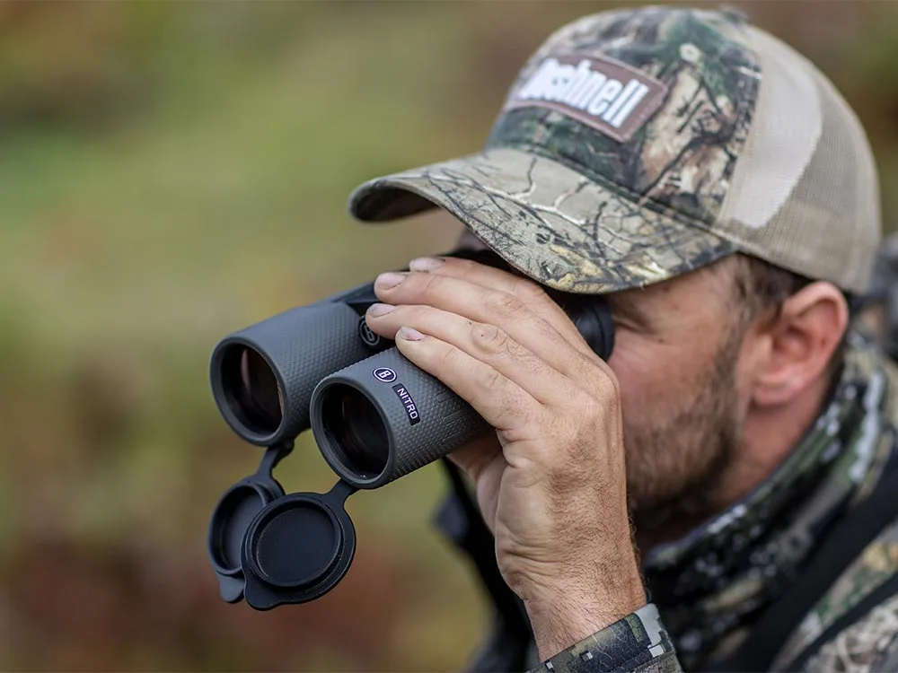 hunter looking through binoculars