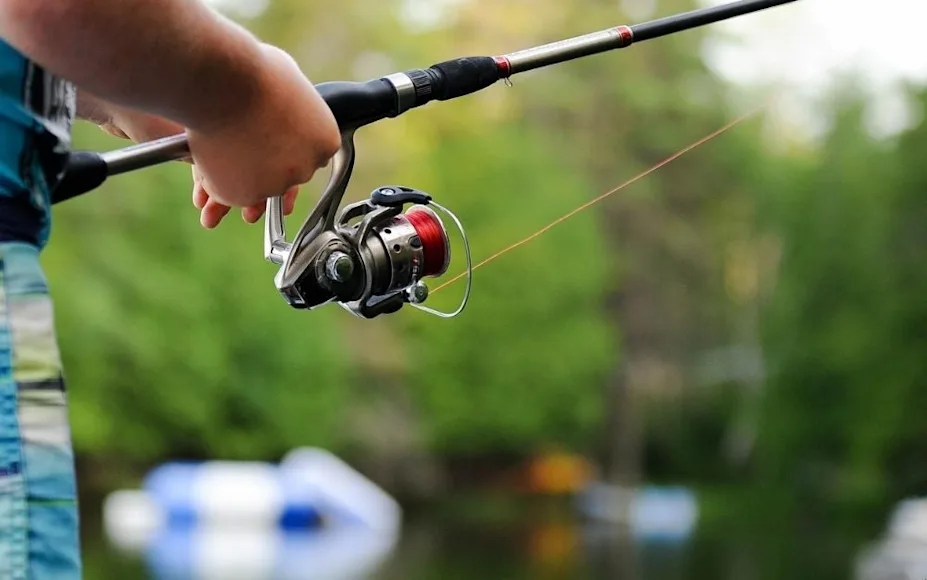 A spinning reel in use.