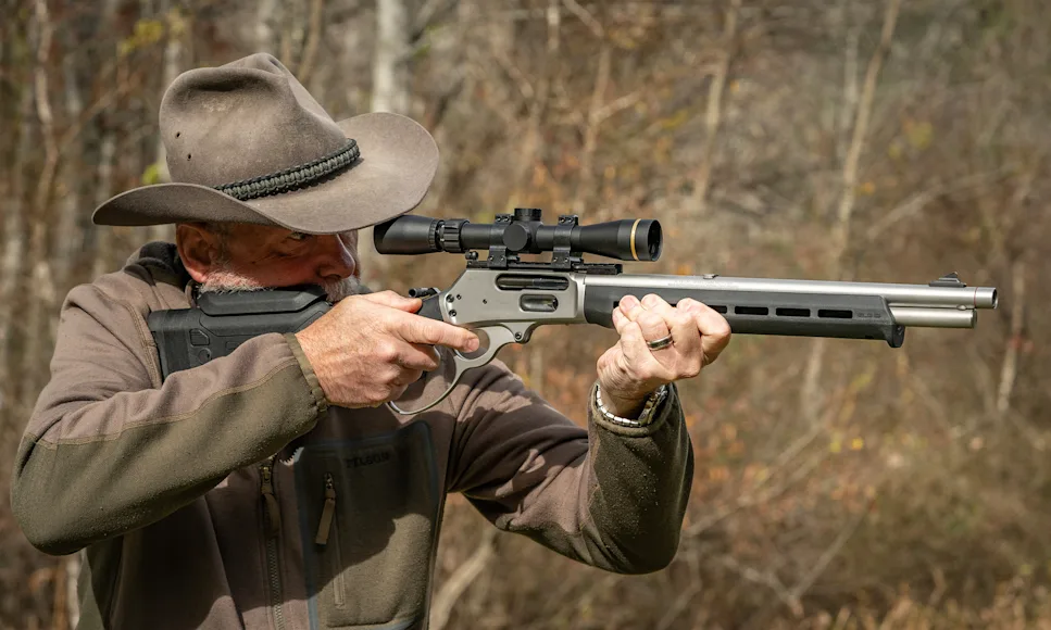 A shooter fires the new Marlin 1895 Trapper rifle on a outdoor range.