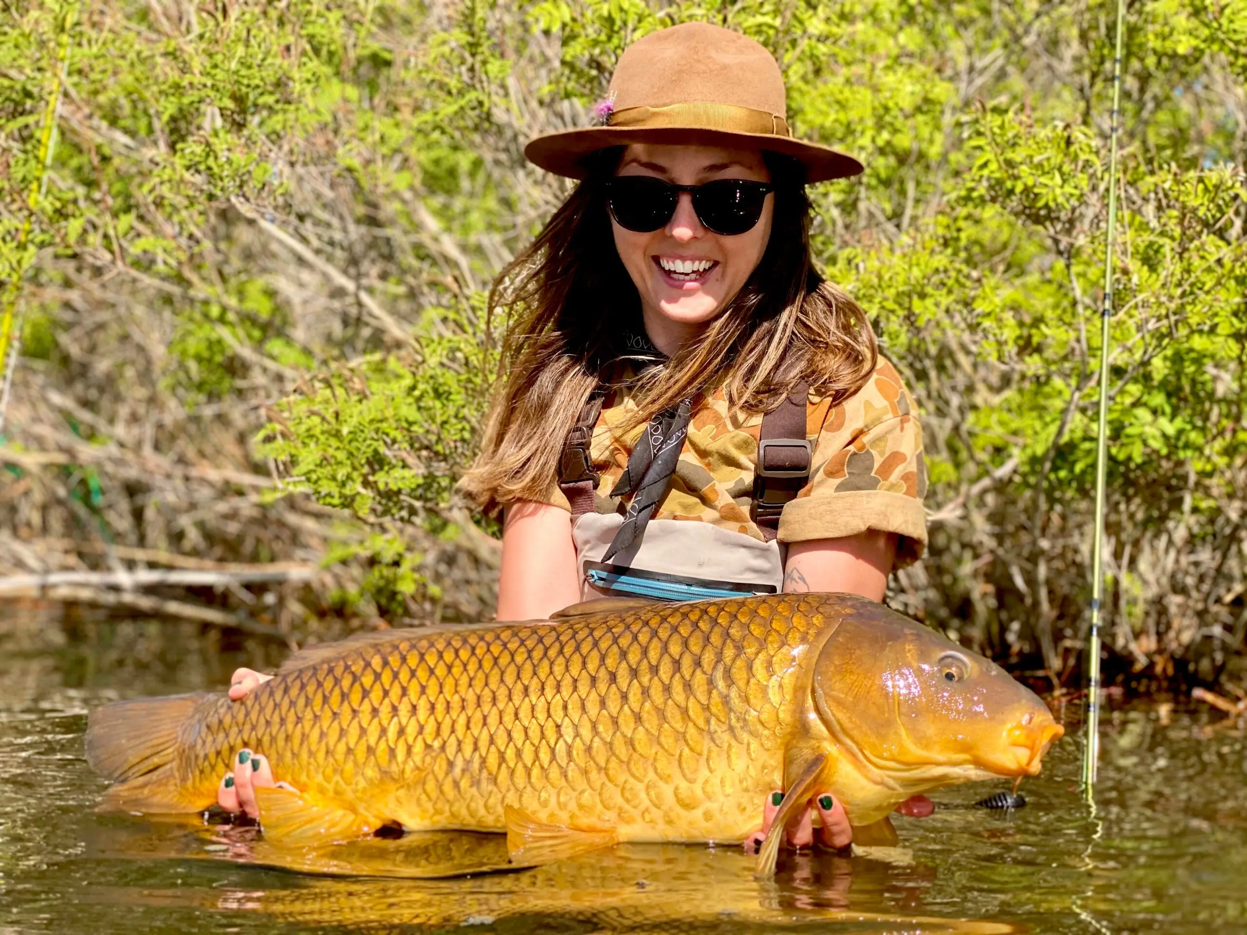 photo of angler with big carp