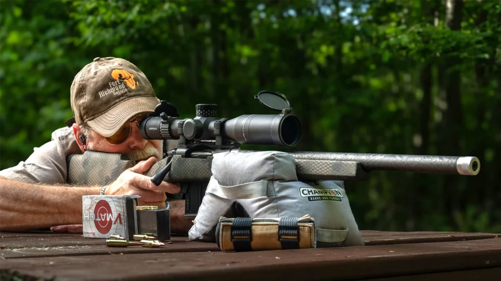 A shooter test fires the new Proof Research Elevation 2.0 rifle from a bench rest. 