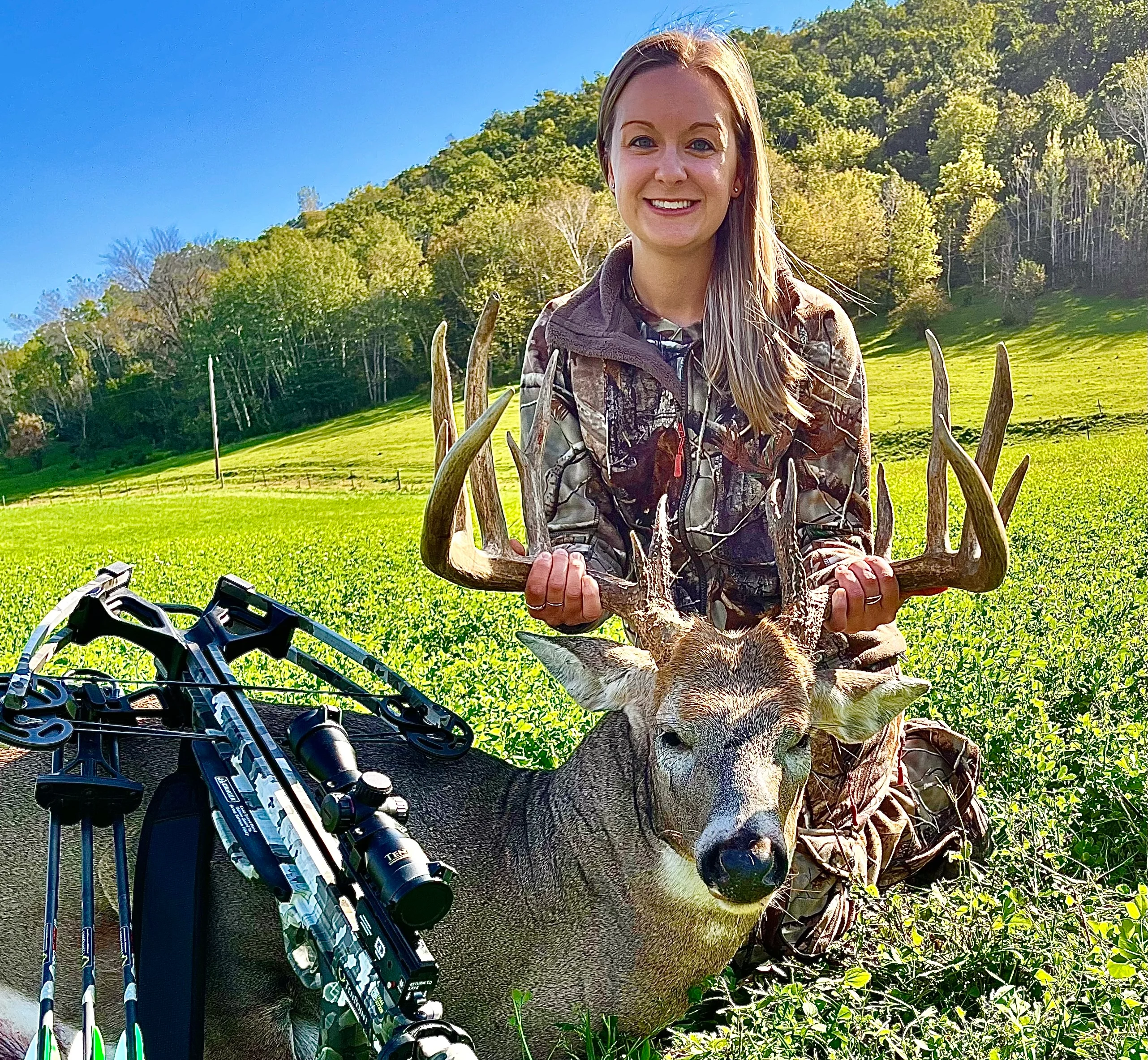 Minnesota hunter Lisa Boyum poses with a big whitetail buck she took with a crossbow. 