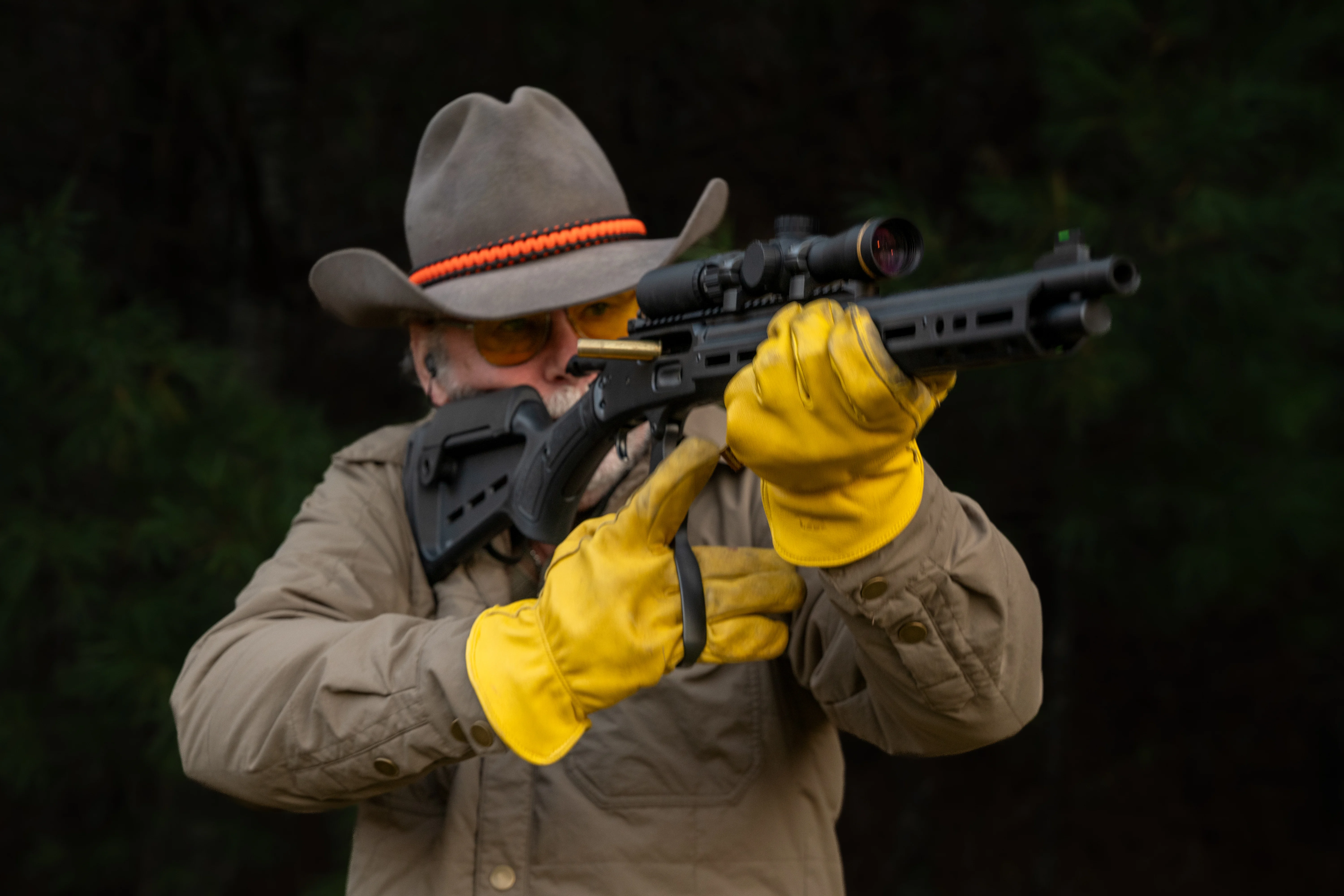 A shooter fires the Marlin 1985 Dark Series lever-action rifle. 
