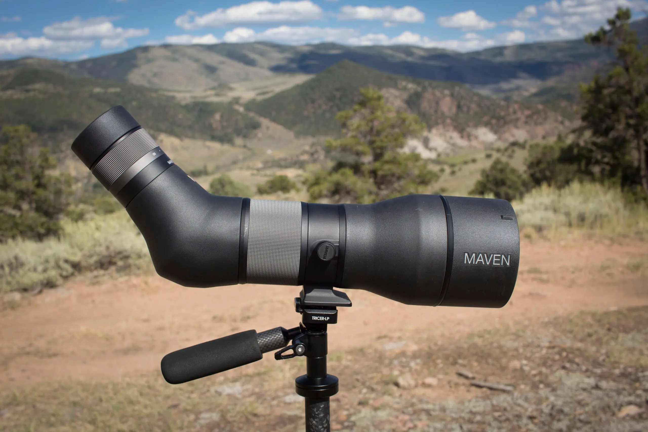 Maven S.1 spotting scope on tripod with mountains in the background