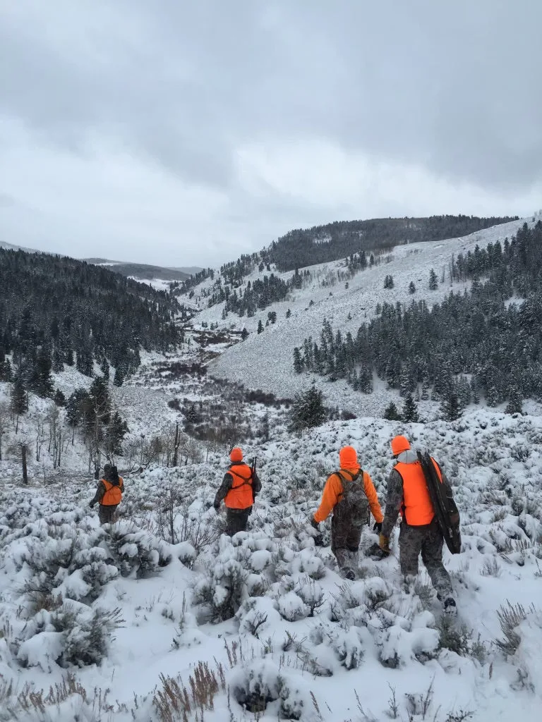 photo of hunter heading out on a mule deer drive