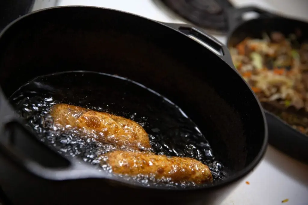 Frying egg rolls in cast iron