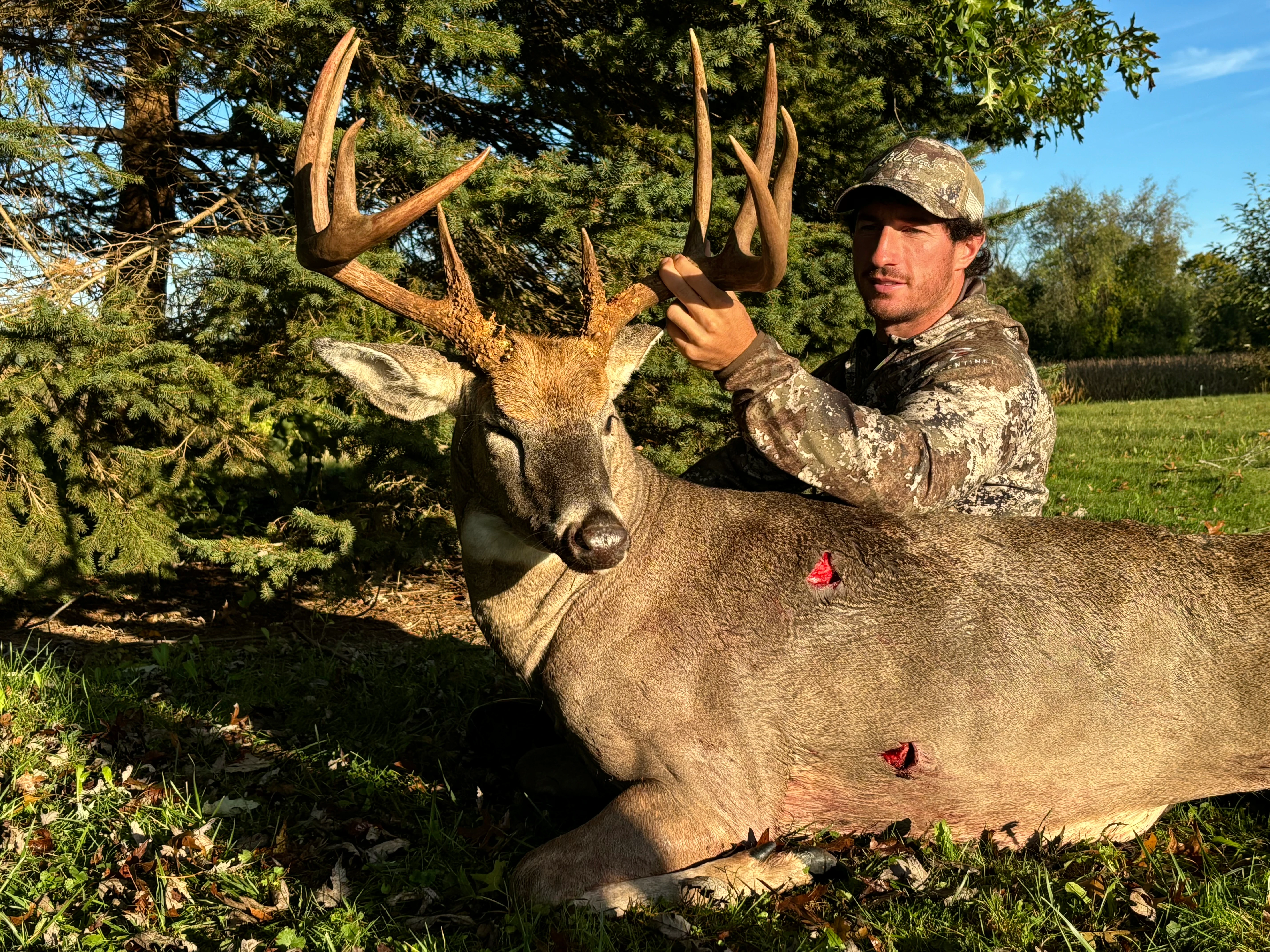 An Ohio hunter poses with a 200-plus inch buck taken in 2024. 