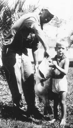 An angler poses with the al-tackle world record and Georgia state record for largemouth bass. 