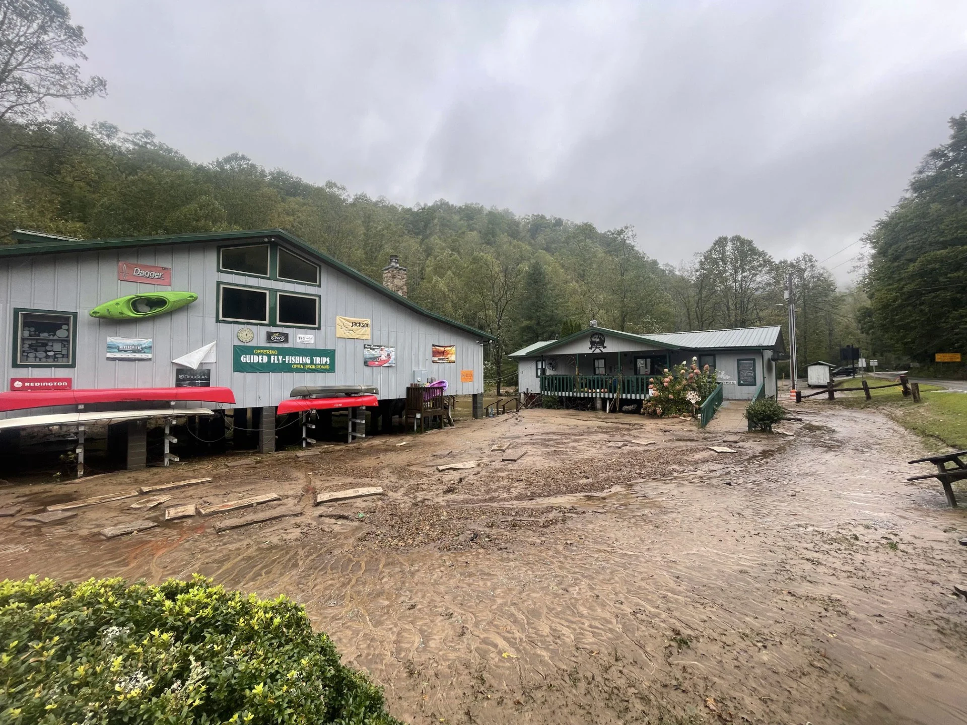 Flooding impacts a fly fishing shop and guide service in western North Carolina. 