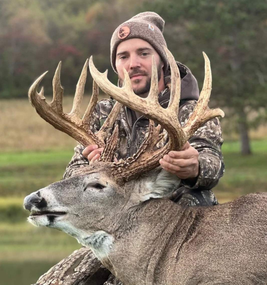 An Ohio bowhuntner shows off a trophy whitetail taken in 2024. 