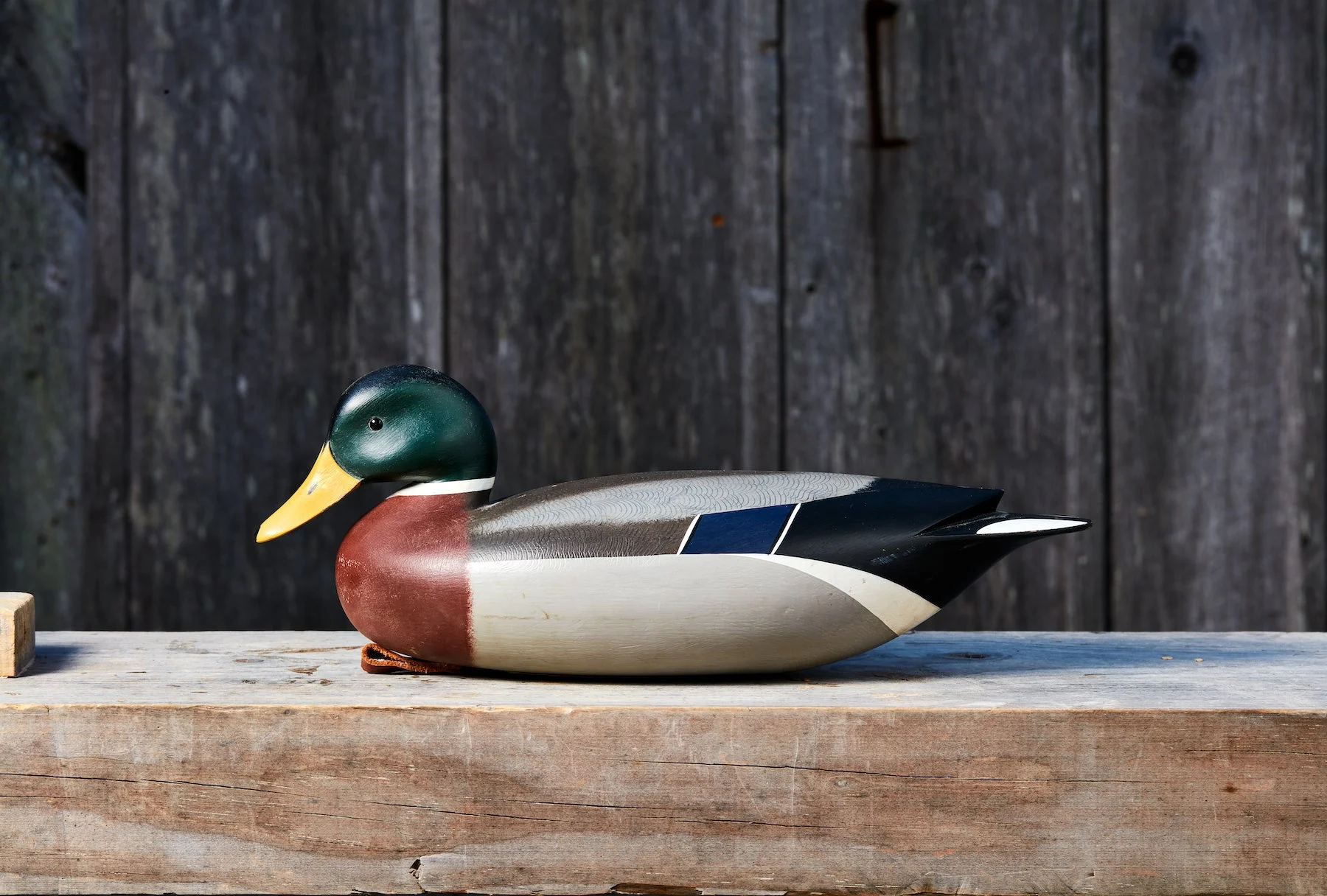 A hand-carved mallard drake decoy.