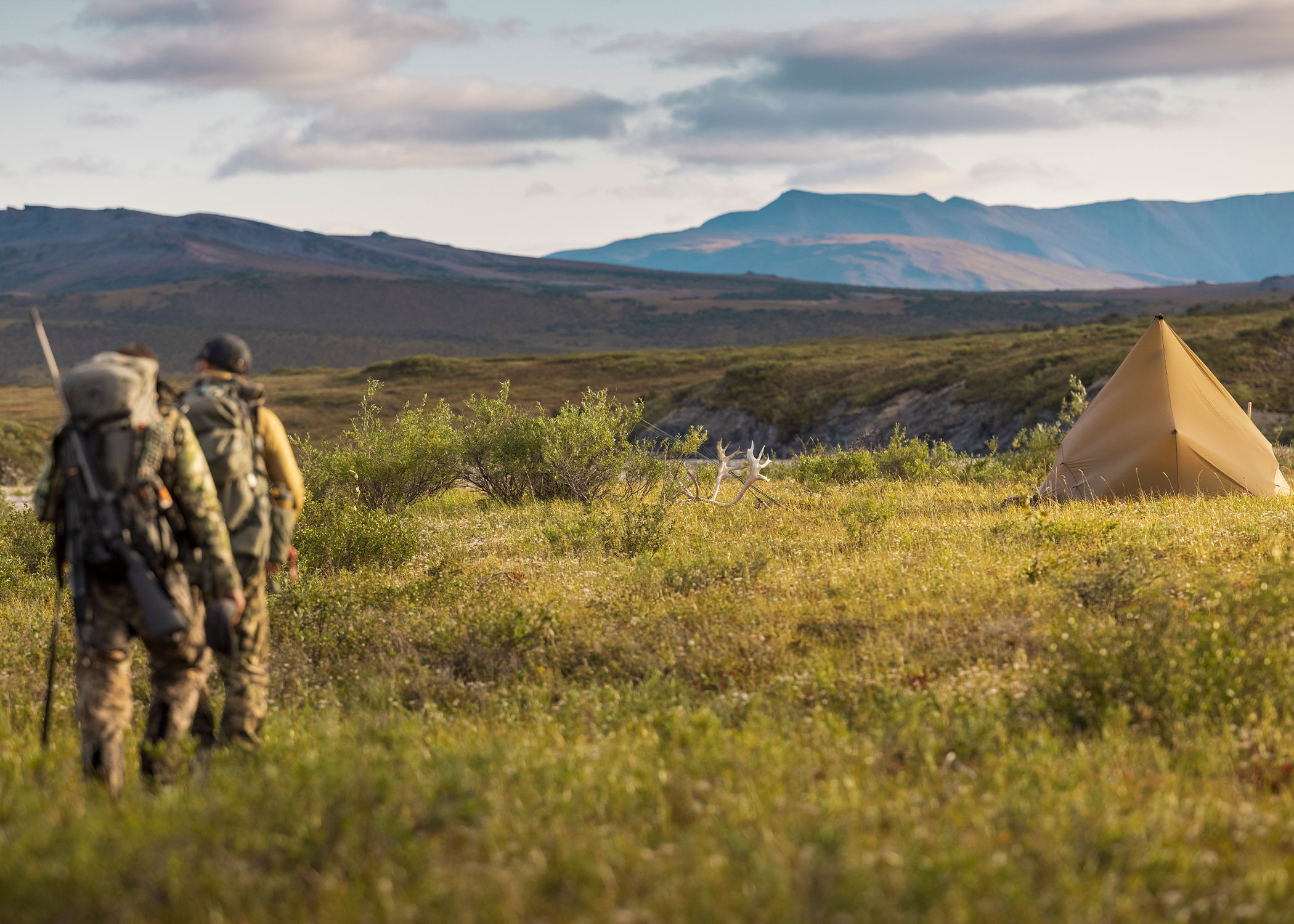 Hunters hike through the Brooks Range en route to camp. 