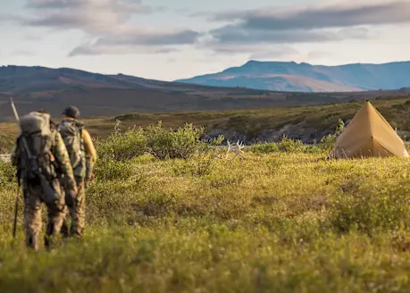 Hunters hike through the Brooks Range en route to camp. 