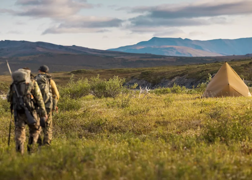Hunters hike through the Brooks Range en route to camp.