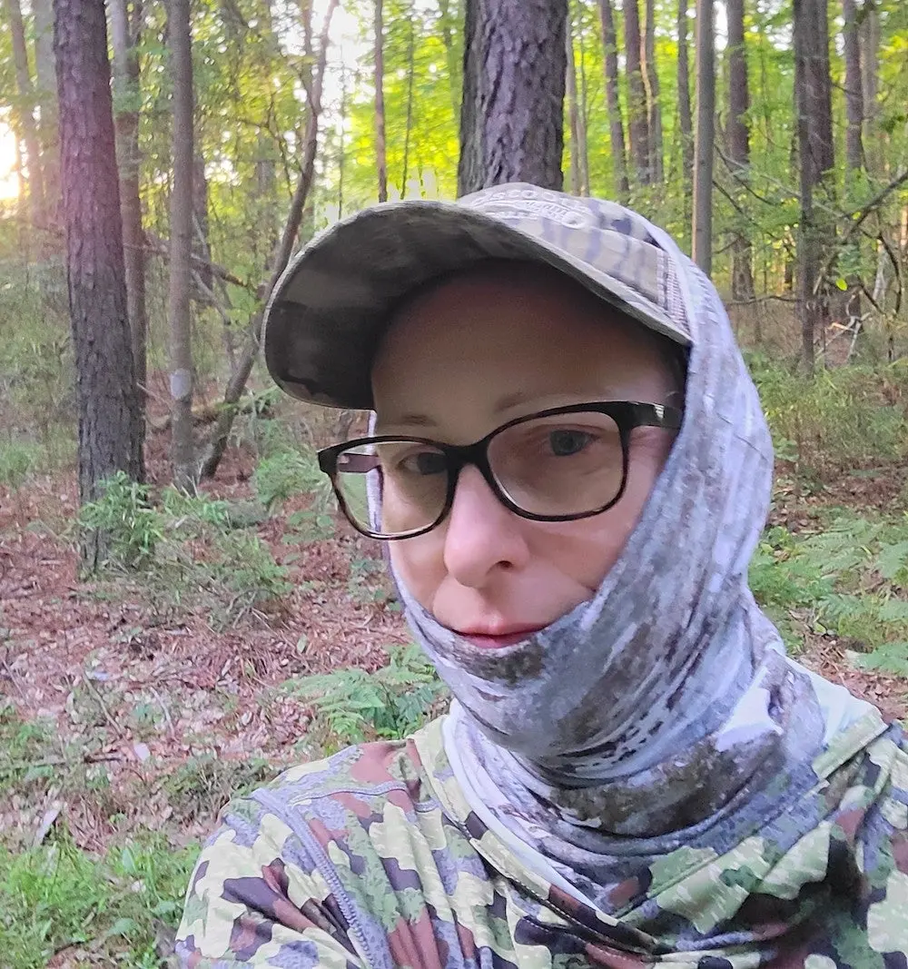 Female hunter wearing Buff insect shield neck gaiter