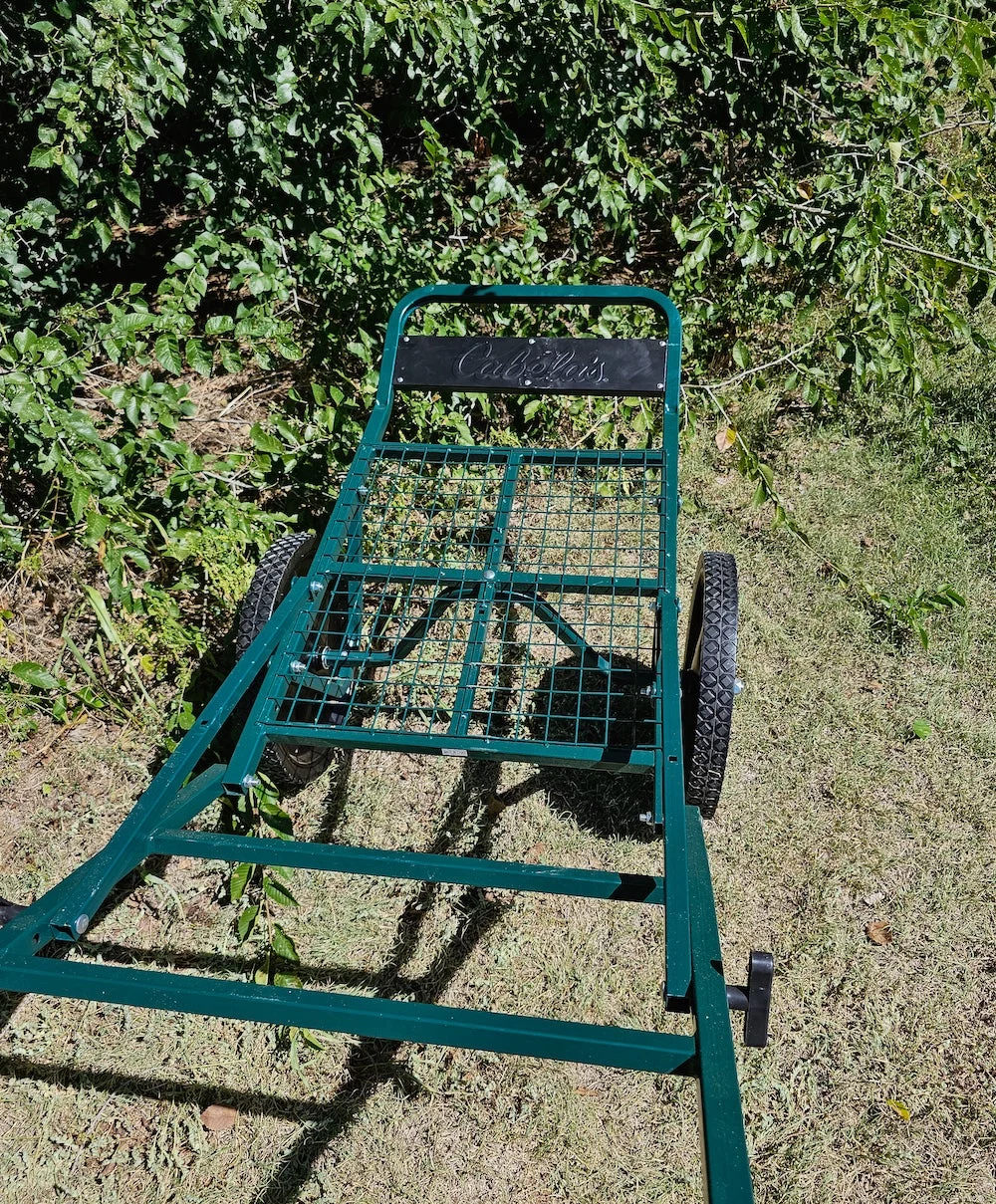 Cabela's Game Cart sitting in grass