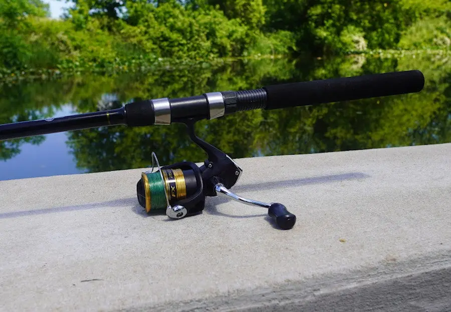 Shimano FX Spinning Combo sitting on boat