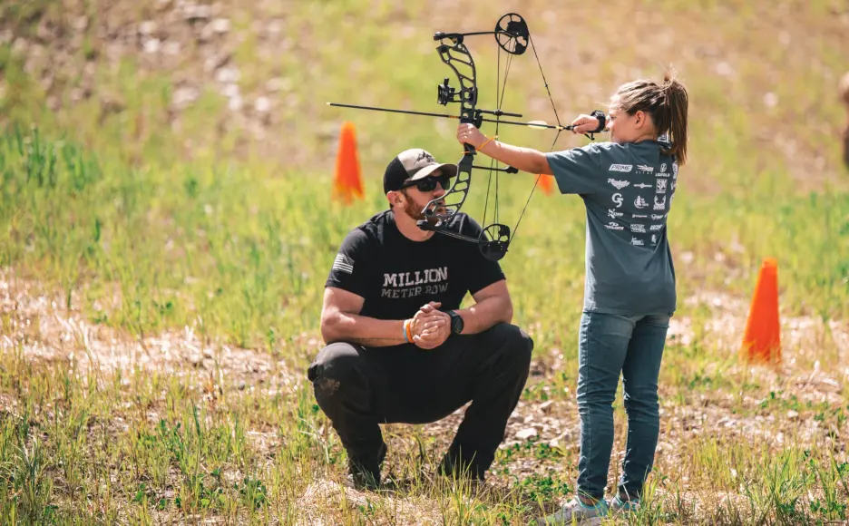 Young girl shoot a Quest Centec bow