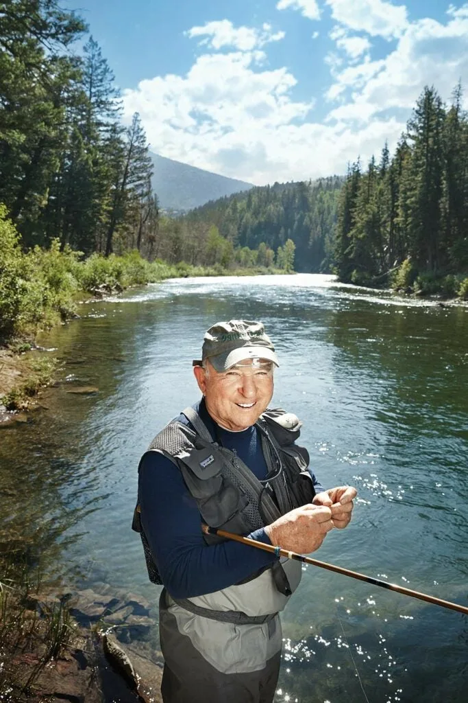 yvon chouinard changing the fly on his tenkara fishing rod