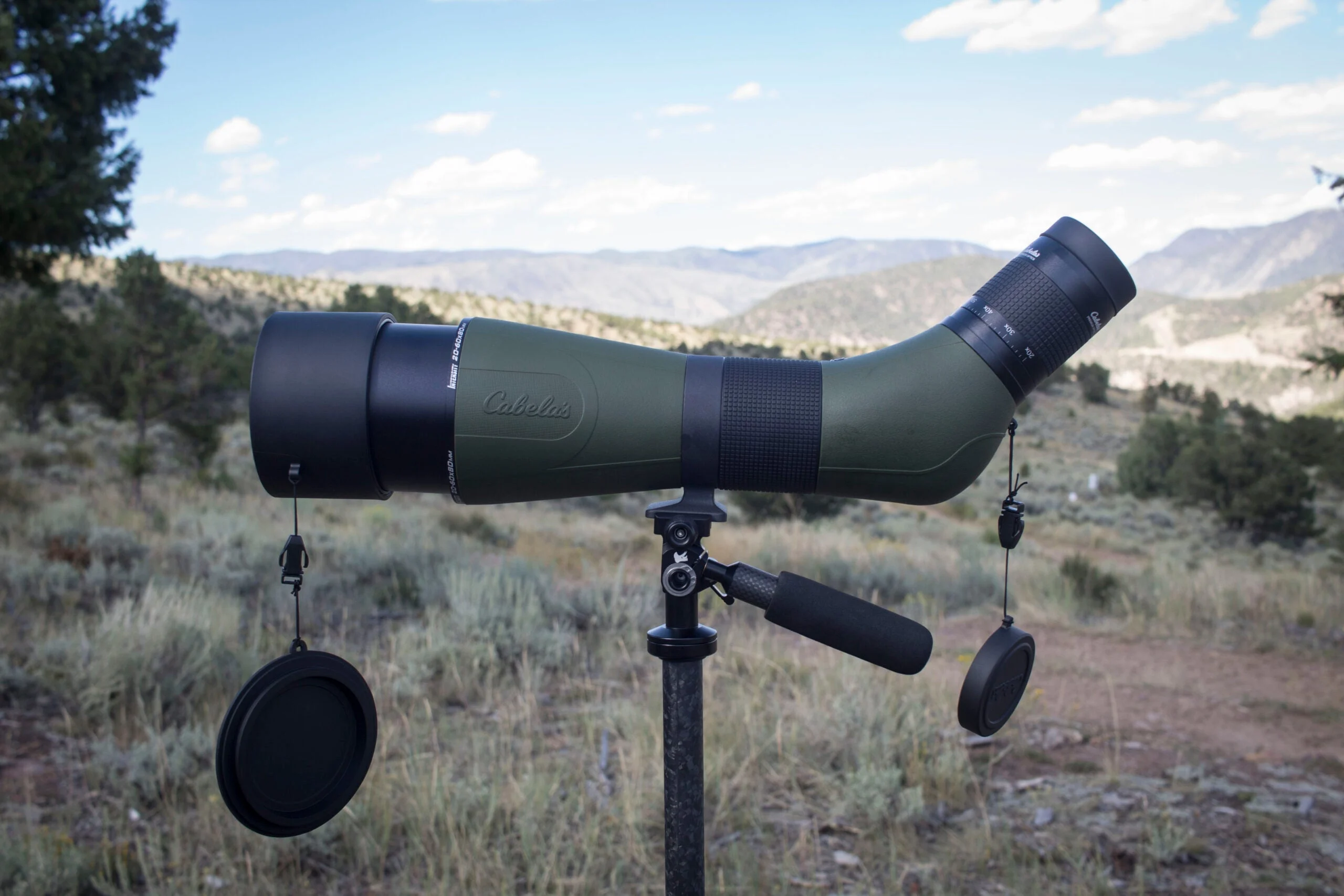 Cabela's Spotting Scope on tripod with mountains in the background